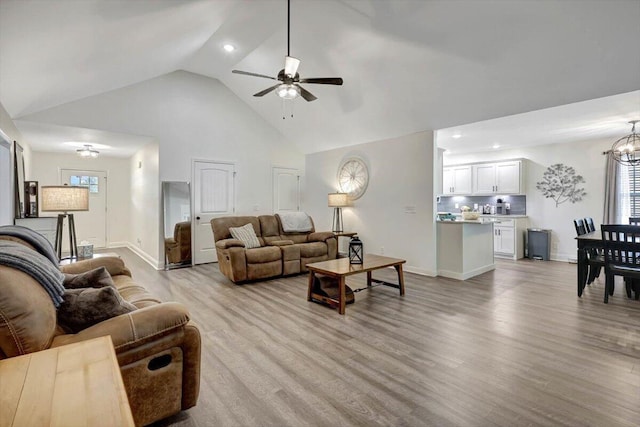 3128 Crow Rd NE, Dalton, GA 30721 - living area featuring a ceiling fan, high vaulted ceiling, baseboards, light wood-type flooring, and recessed lighting