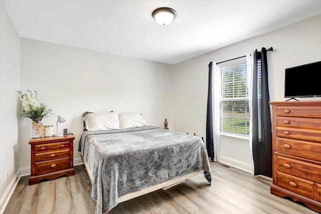 3128 Crow Rd NE, Dalton, GA 30721 - bedroom with light wood finished floors and baseboards