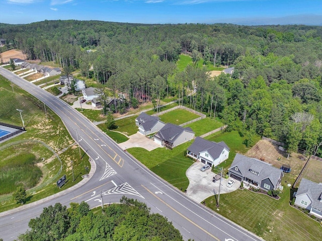 3128 Crow Rd NE, Dalton, GA 30721 - view of property location featuring a heavily wooded area and nearby suburban area