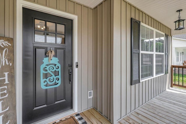 3128 Crow Rd NE, Dalton, GA 30721 - entrance to property with covered porch and board and batten siding