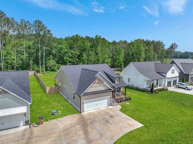 3128 Crow Rd NE, Dalton, GA 30721 - aerial view of property and surrounding area with a heavily wooded area