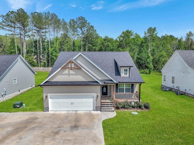 3128 Crow Rd NE, Dalton, GA 30721 - view of front facade with covered porch, roof with shingles, concrete driveway, an attached garage, and a front lawn