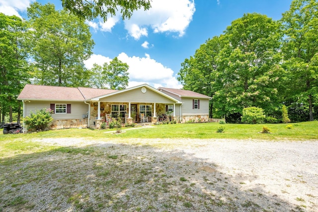 222 Bennie Camp Rd, Dunlap, TN 37327 - view of front of home featuring stone siding, a porch, and a front lawn