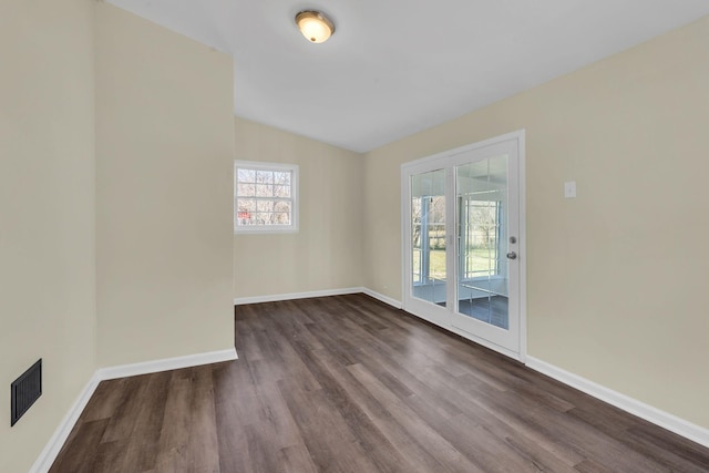 806 Drummond Dr, Nashville, TN 37211 - spare room featuring dark wood-style floors, baseboards, and lofted ceiling