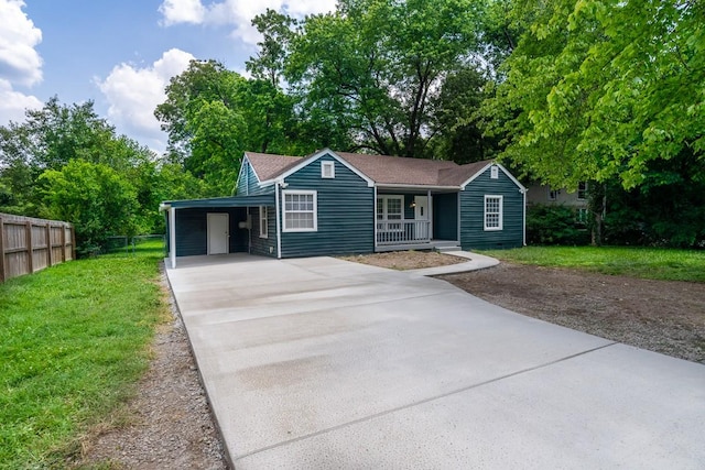 806 Drummond Dr, Nashville, TN 37211 - single story home featuring covered porch, concrete driveway, an attached carport, view of scattered trees, and a shingled roof