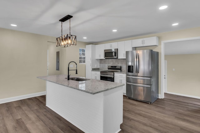 806 Drummond Dr, Nashville, TN 37211 - kitchen with appliances with stainless steel finishes, a sink, white cabinetry, baseboards, and recessed lighting