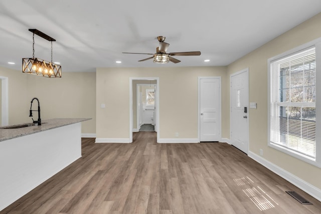 806 Drummond Dr, Nashville, TN 37211 - unfurnished living room with a sink, wood finished floors, recessed lighting, baseboards, and a ceiling fan