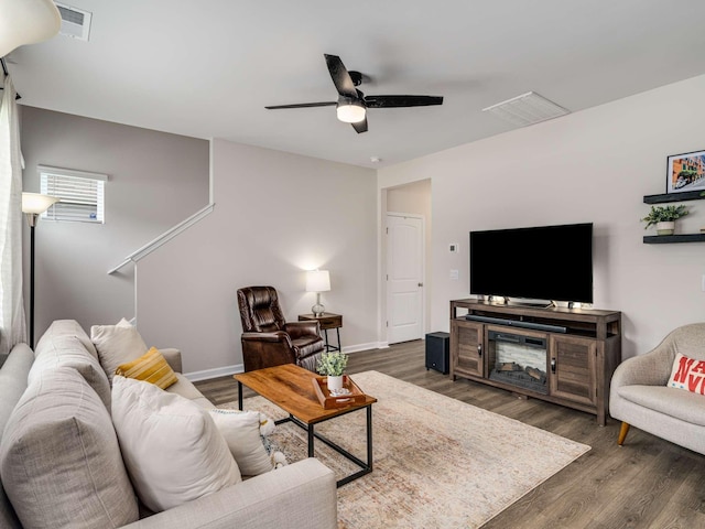 7231 Carrie Ct, Antioch, TN 37013 - living area featuring wood finished floors, ceiling fan, and baseboards