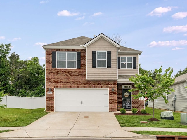 7231 Carrie Ct, Antioch, TN 37013 - view of front of property with an attached garage, driveway, and brick siding