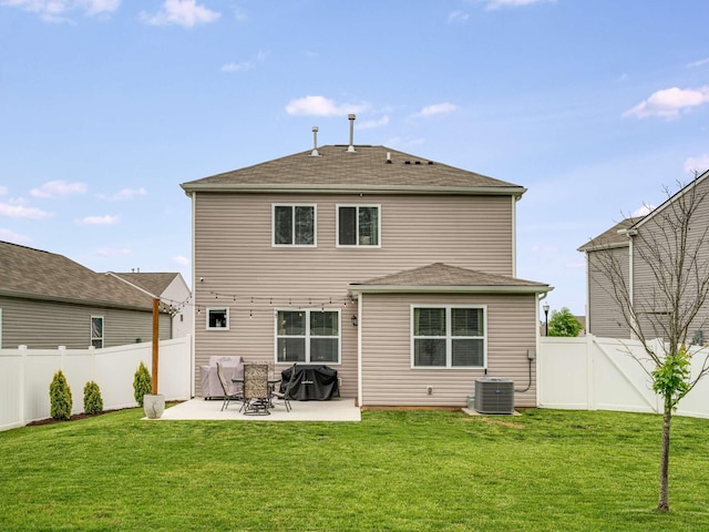 7231 Carrie Ct, Antioch, TN 37013 - rear view of house with a patio, cooling unit, and a shingled roof
