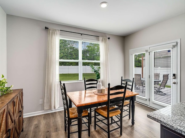 7231 Carrie Ct, Antioch, TN 37013 - dining space featuring healthy amount of natural light, wood finished floors, and baseboards