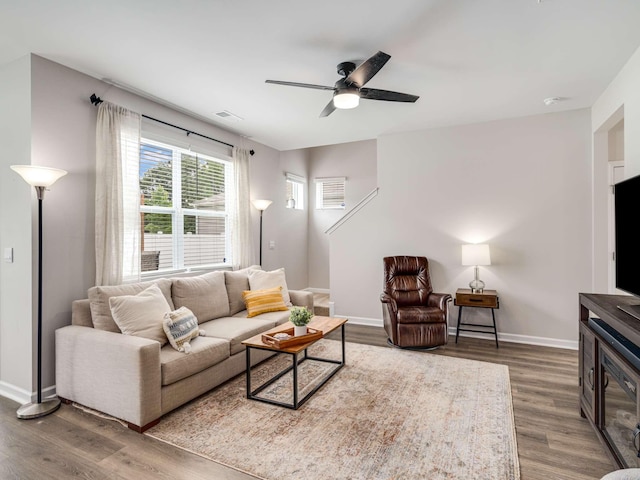 7231 Carrie Ct, Antioch, TN 37013 - living room with wood finished floors, a ceiling fan, and baseboards
