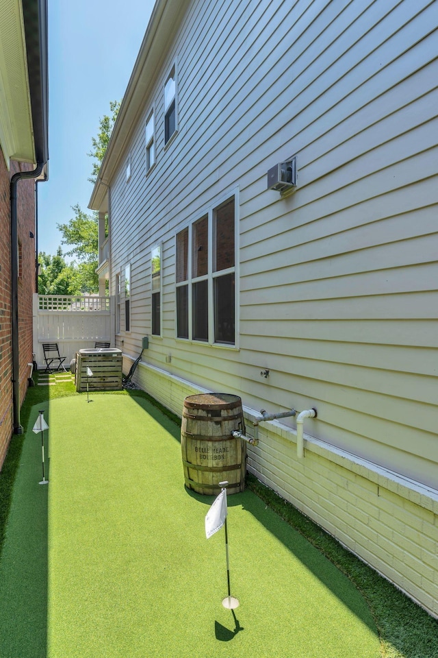 118 Jasper Ave, Franklin, TN 37064 - view of yard with a putting green and central AC unit