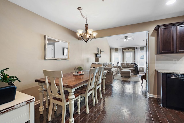 1071 Muna Ct, Spring Hill, TN 37174 - dining room with a ceiling fan, baseboards, dark wood-style flooring, and a chandelier