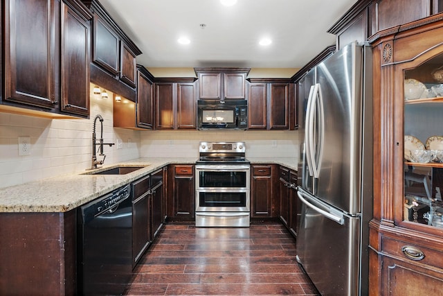 1071 Muna Ct, Spring Hill, TN 37174 - kitchen with black appliances, a sink, dark wood-style floors, light stone countertops, and dark brown cabinetry