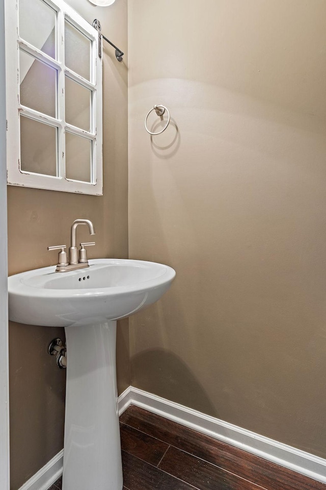 1071 Muna Ct, Spring Hill, TN 37174 - bathroom with baseboards, wood finished floors, and a sink