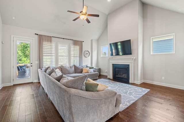 1210 Proprietors Pl, Murfreesboro, TN 37128 - living area with baseboards, high vaulted ceiling, dark wood-style flooring, a glass covered fireplace, and ceiling fan