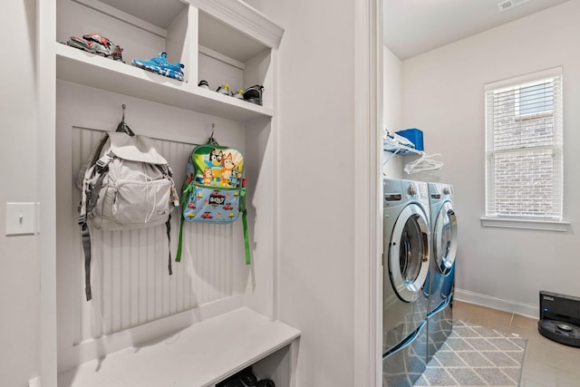 1210 Proprietors Pl, Murfreesboro, TN 37128 - laundry room with washer and dryer, tile patterned flooring, and baseboards