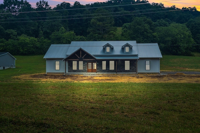 53 Kemp Hollow Rd, Pleasant Shade, TN 37145 - view of front facade featuring a yard, a metal roof, and a view of trees