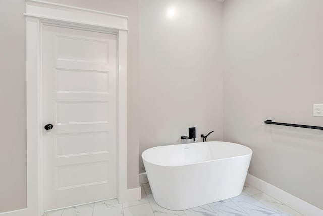 53 Kemp Hollow Rd, Pleasant Shade, TN 37145 - bathroom with marble look tiles and a soaking tub