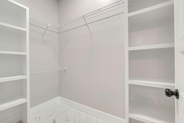 53 Kemp Hollow Rd, Pleasant Shade, TN 37145 - walk in closet featuring marble look tiles