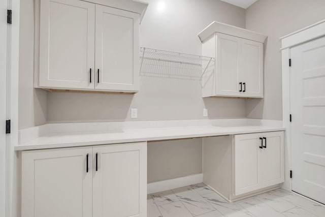 53 Kemp Hollow Rd, Pleasant Shade, TN 37145 - laundry area featuring light marble finish flooring and baseboards