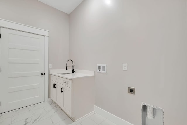 53 Kemp Hollow Rd, Pleasant Shade, TN 37145 - laundry room featuring hookup for an electric dryer, light marble finish floors, washer hookup, and cabinet space