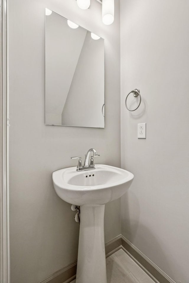 2342 N Tennessee Blvd Unit 1203, Murfreesboro, TN 37130 - bathroom with baseboards and a sink