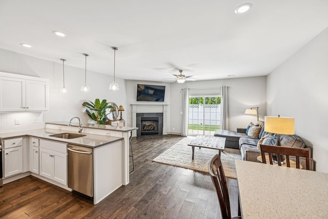 2342 N Tennessee Blvd Unit 1203, Murfreesboro, TN 37130 - kitchen featuring dishwasher, a sink, open floor plan, ceiling fan, and white cabinetry