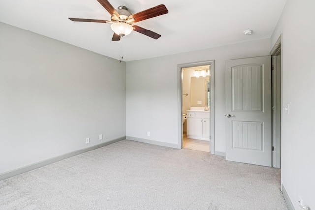 2342 N Tennessee Blvd Unit 1203, Murfreesboro, TN 37130 - unfurnished bedroom with light colored carpet, baseboards, connected bathroom, and ceiling fan