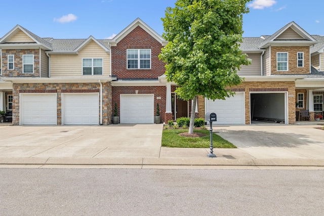 2342 N Tennessee Blvd Unit 1203, Murfreesboro, TN 37130 - multi unit property featuring a garage, driveway, and roof with shingles