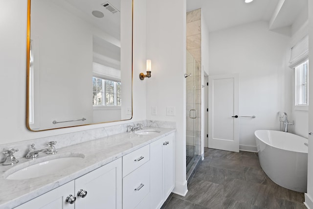 519 Chesterfield Ave Unit 1, Nashville, TN 37212 - full bath with a stall shower, a freestanding bath, and double vanity