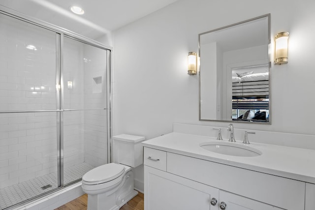 519 Chesterfield Ave Unit 1, Nashville, TN 37212 - bathroom with wood finished floors, vanity, toilet, and a shower stall