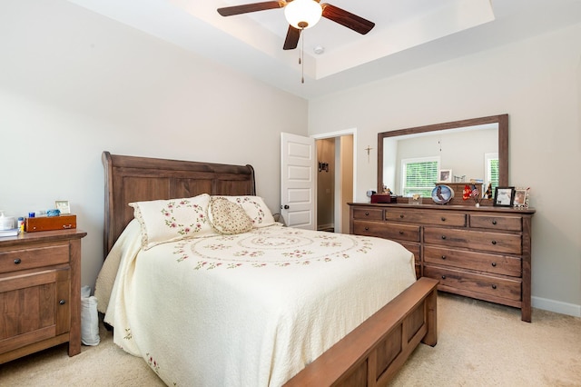 3045 Tacoma Ln, Goodlettsville, TN 37072 - bedroom featuring light colored carpet, a raised ceiling, a ceiling fan, and baseboards