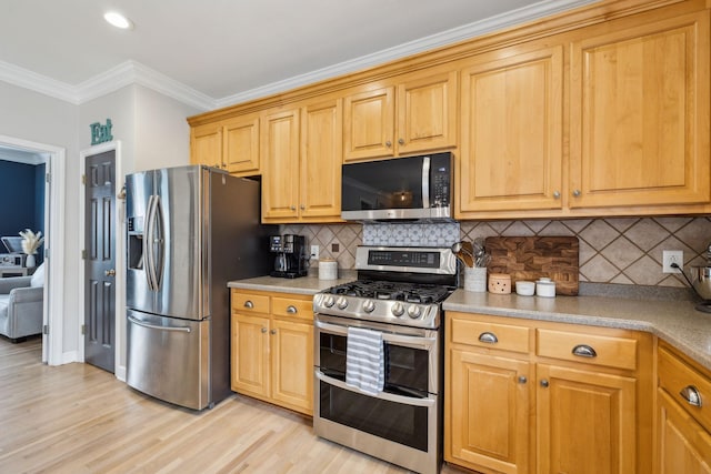 2005 Keene Cir, Spring Hill, TN 37174 - kitchen with stainless steel appliances, light wood-type flooring, crown molding, tasteful backsplash, and light countertops