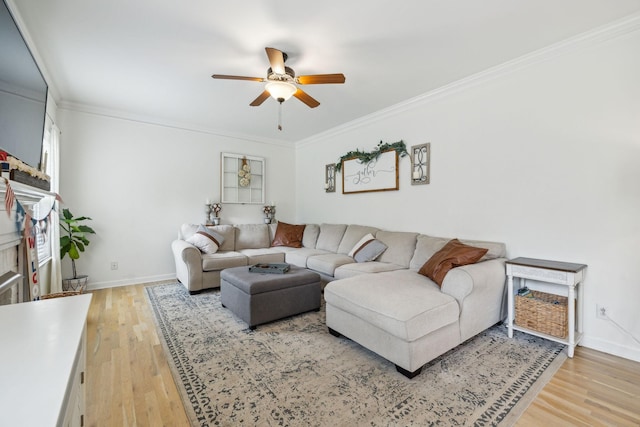 2005 Keene Cir, Spring Hill, TN 37174 - living area featuring a ceiling fan, light wood finished floors, crown molding, and baseboards