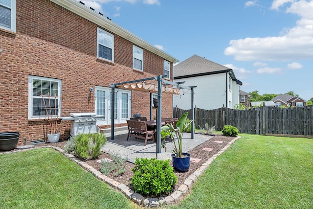 2005 Keene Cir, Spring Hill, TN 37174 - back of property with a pergola, brick siding, and a patio area