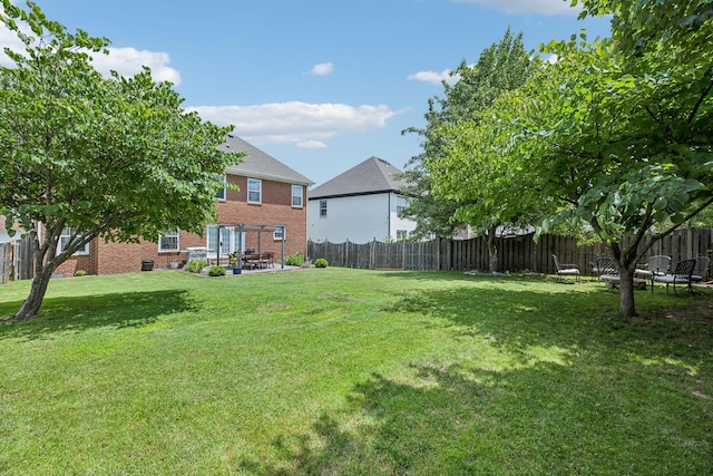 2005 Keene Cir, Spring Hill, TN 37174 - view of yard featuring an outdoor fire pit and a patio area
