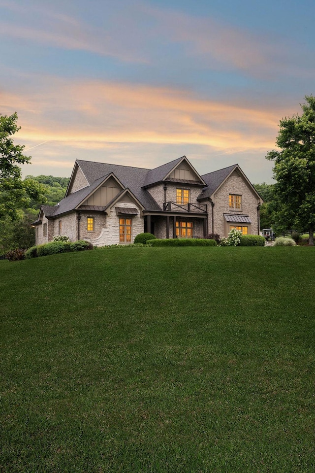 4620 Nadine Ln, Franklin, TN 37064 - view of front of house with stone siding, a yard, and board and batten siding