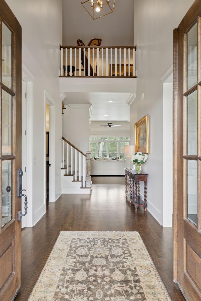 4620 Nadine Ln, Franklin, TN 37064 - entryway with stairs, a towering ceiling, a ceiling fan, wood finished floors, and baseboards