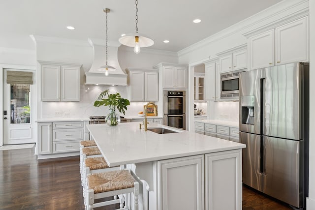 4620 Nadine Ln, Franklin, TN 37064 - kitchen with stainless steel appliances, a sink, crown molding, white cabinets, and decorative backsplash