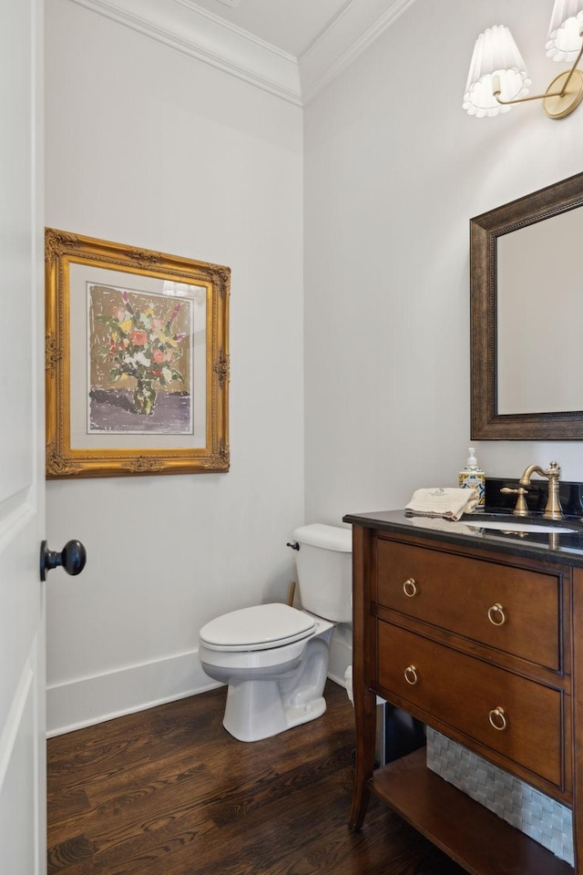 4620 Nadine Ln, Franklin, TN 37064 - half bath with crown molding, wood finished floors, baseboards, vanity, and toilet