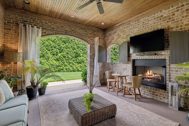 4620 Nadine Ln, Franklin, TN 37064 - view of patio / terrace with an outdoor brick fireplace and a ceiling fan