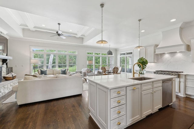 4620 Nadine Ln, Franklin, TN 37064 - kitchen featuring a sink, appliances with stainless steel finishes, light countertops, ceiling fan, and ornamental molding