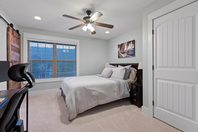 808 Willcrest Dr, Chattanooga, TN 37405 - bedroom featuring light colored carpet, recessed lighting, a ceiling fan, a barn door, and baseboards