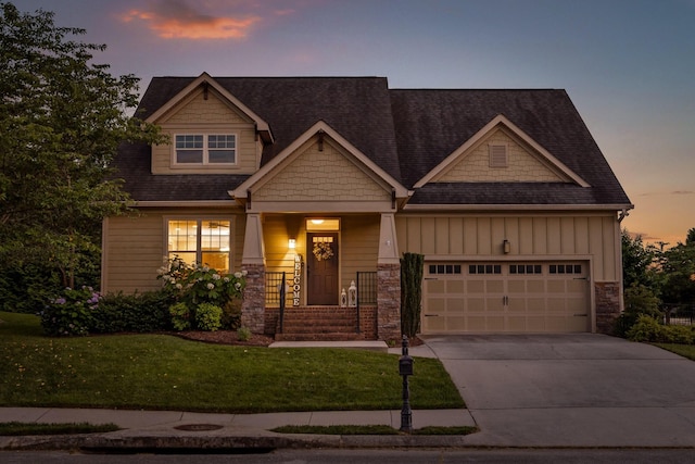 808 Willcrest Dr, Chattanooga, TN 37405 - craftsman-style house with board and batten siding, concrete driveway, a front yard, stone siding, and an attached garage