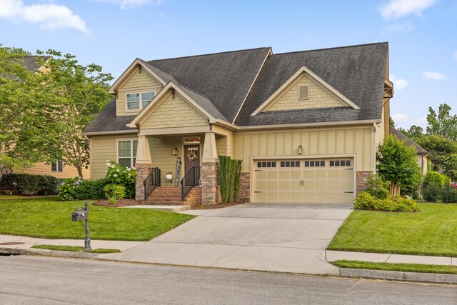 808 Willcrest Dr, Chattanooga, TN 37405 - craftsman house featuring board and batten siding, stone siding, driveway, and an attached garage