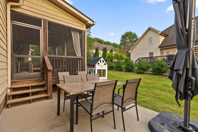 808 Willcrest Dr, Chattanooga, TN 37405 - view of patio / terrace featuring a sunroom, outdoor dining area, and an outbuilding