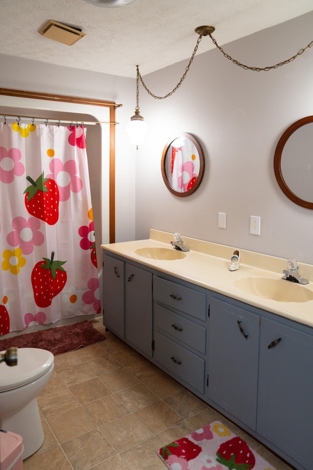 4169 Bledsoe St, Westmoreland, TN 37186 - full bathroom with double vanity, toilet, and a shower with shower curtain