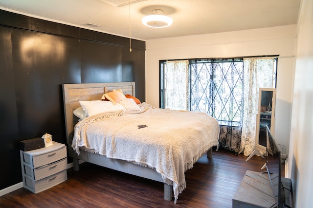 4169 Bledsoe St, Westmoreland, TN 37186 - bedroom featuring attic access and dark wood-style flooring